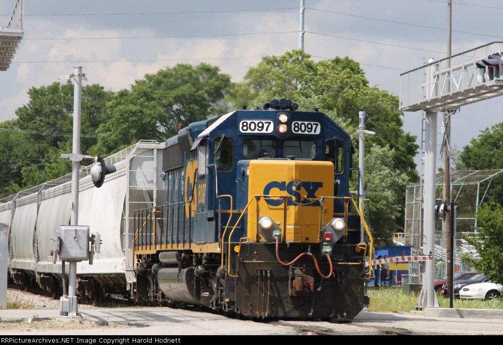 CSX 8097 leads a train towards Bennett Yard on the Andrews sub under threatening skies